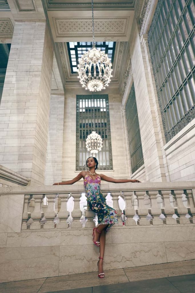Karina Di Angeli Sequin Dress; Francesca Bellavita Pink Sandals; Erickson Beamon Alligator Necklace, Drop Earrings, Floral Ring; Kate Spade Watch.
